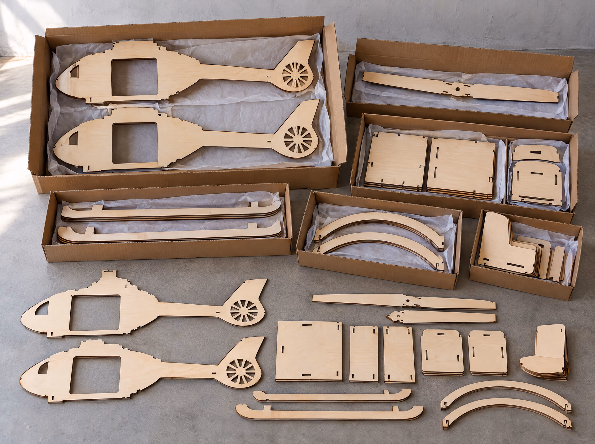 The kit of the Rescue helicopter XL: cut parts in boxes per building phase